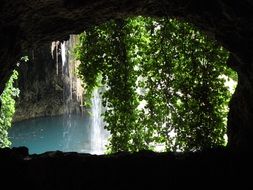 cave behind a waterfall