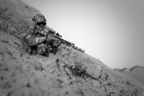 Soldier with gun black and white photo