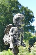 stone angel figure in the park