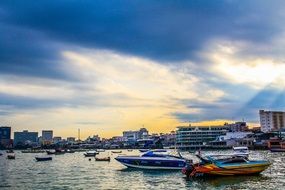 colorful motor boats in bay at sity, thailand