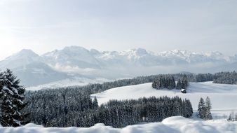 panoramic view of the tennengebirge mountain range in winter