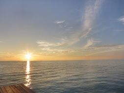 sunset on the sea horizon in the maldives