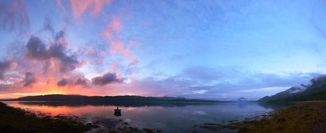 pink-blue sunset over a fjord in northern Norway