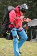 photo of paraglider on the ground
