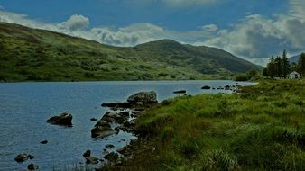 lake among the green hills of ireland