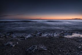 sunset above the clouds on the beach of Costa del Sol in Spain