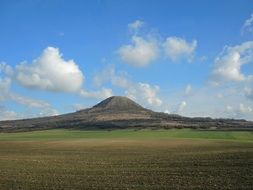 distant view of a mountain on a sunny day