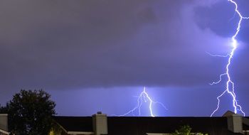 lightning in the sky during a thunderstorm in summer