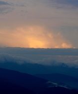 mountain sunset on the top at dusk