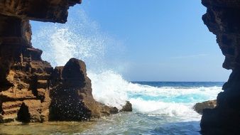 landscape of view from the cave on the ocean surf