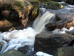 river among large stones like a waterfall