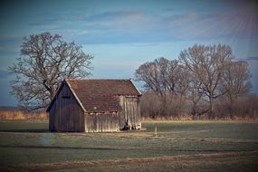 wooden Hut in rural landscape