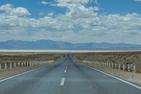 landscape of asphalt road in a desert in south africa