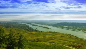 view of the river near green fields