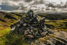 heap of stones Lochinver Coast Scotland Sea