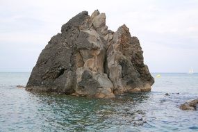 scenic Rock in Sea at Seaside