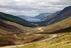 road amid a hill in vibrant scotland countryside