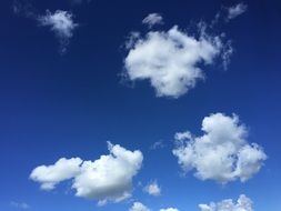 white clouds in blue clear sky