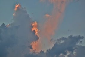 clouds with orange glow during sunset