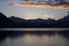 sunset over a lake in new zealand
