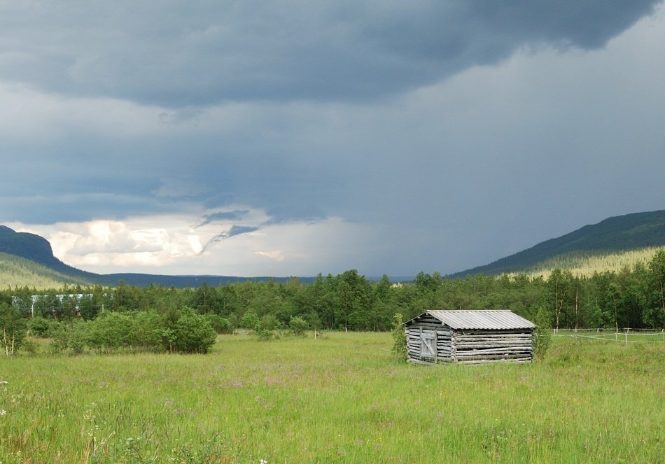 storm clouds over the barn
