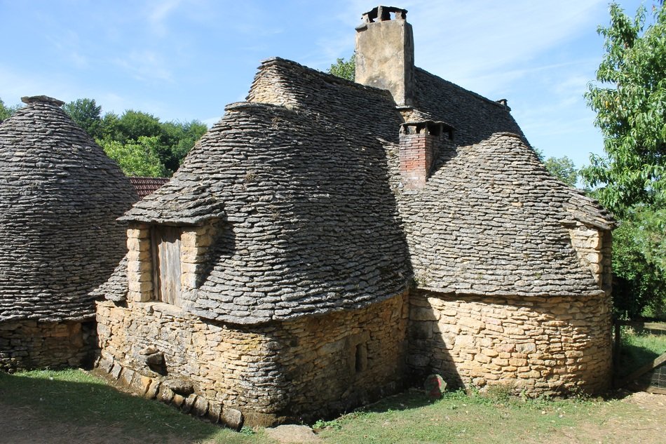 stone huts in the bright sun at breuil
