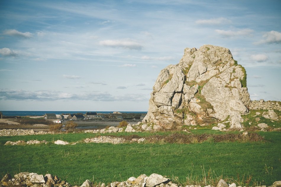 rock on a green field in Oderville, France