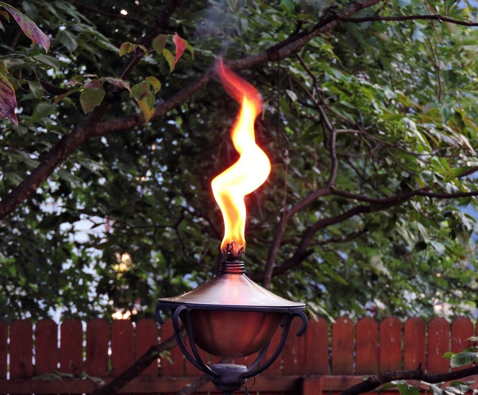 oil lamp with a torch like a street lamp