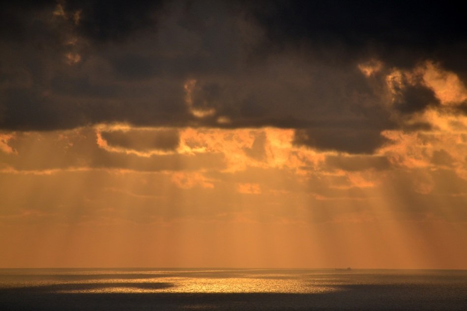 Landscape of sunrise in the clouds over the coast of spain