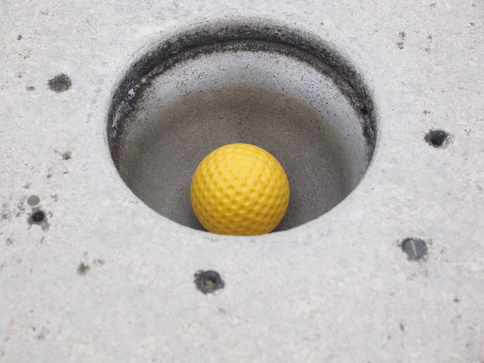 yellow ball in the hole