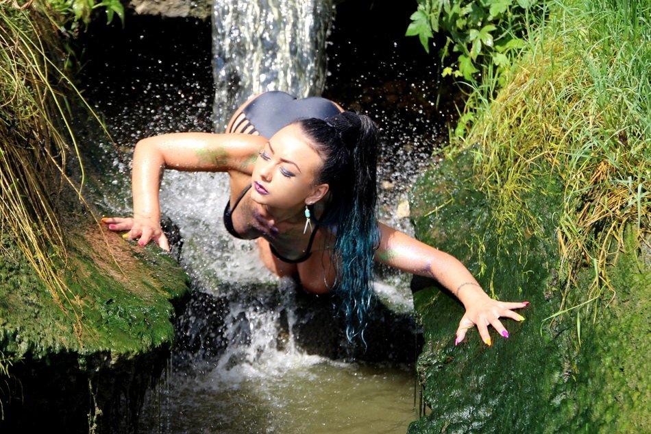 sexy brunette on the water cascade