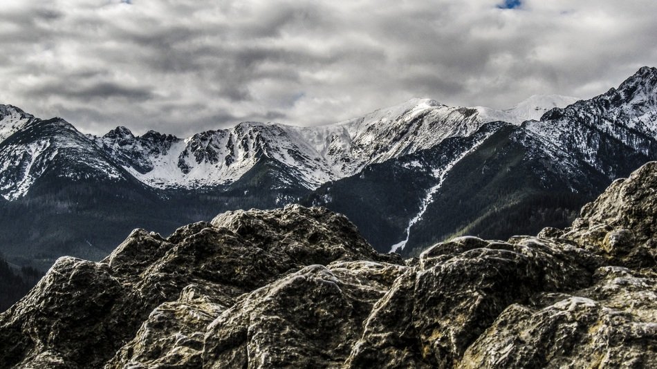 dark clouds over the mountain peaks
