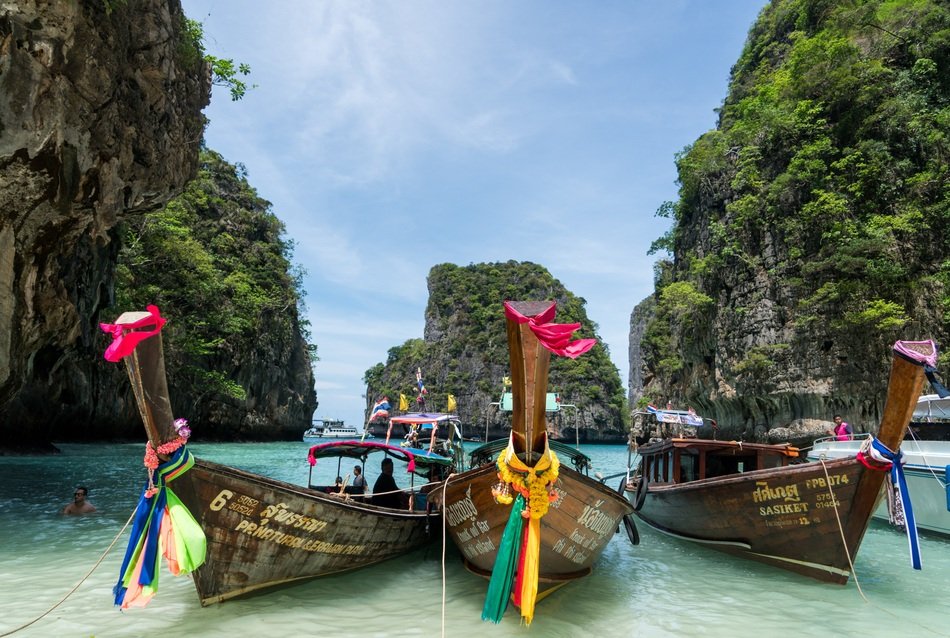 boats for tourist trips on the island of Phi Phi