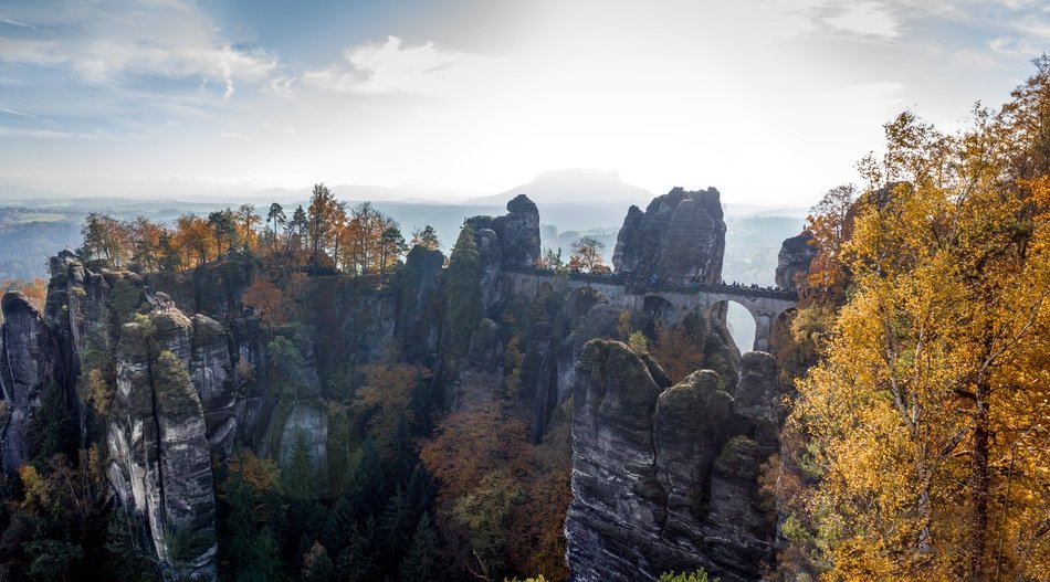 Beautiful and colorful landscape of the rockwall with plants in autumn