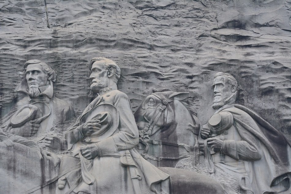 rock relief with people and horses in Georgia