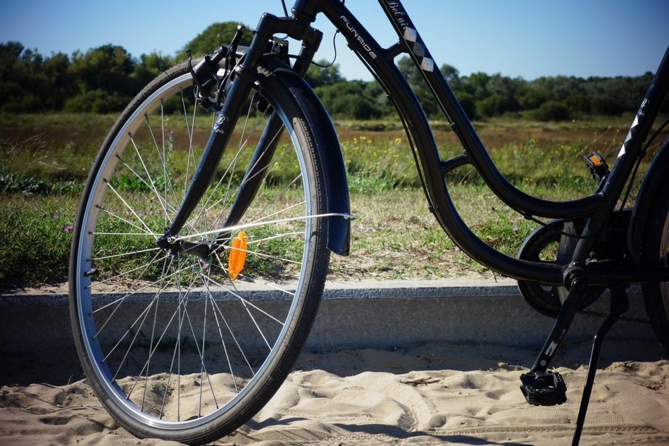 bike on the sand on a sunny day