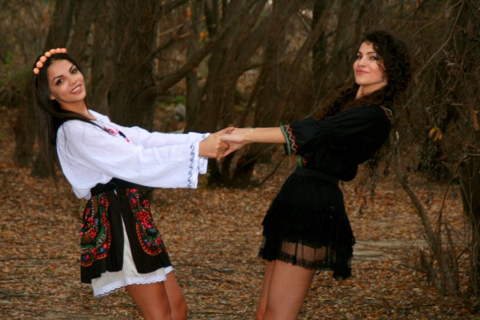 girls dancing in the forest
