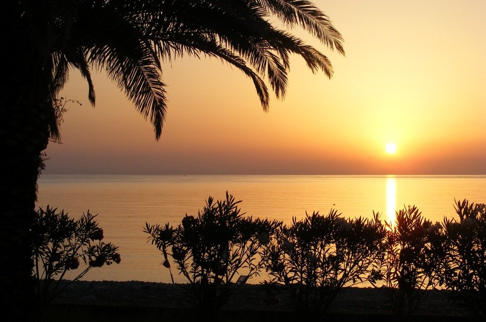 sunset on the beach in montegiordano
