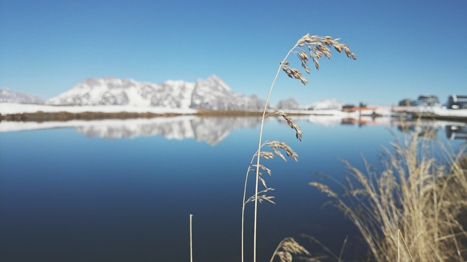 Mountains Mirroring on Lake at Winter