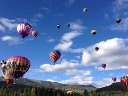 colorful Balloons in Sky above Mountains