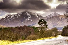 stormy sky over a high snowy mountain