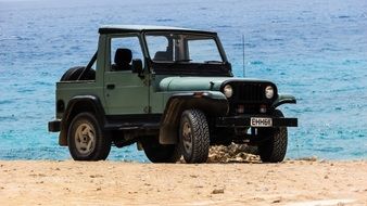 jeep on the coast on a sunny day