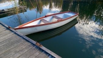 boat on the water in autumn