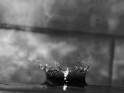 black and white photo of splashing water