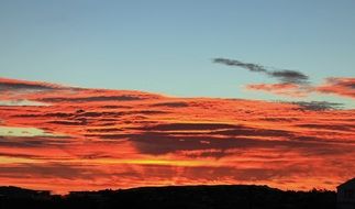 red clouds at sunrise in australia