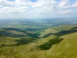 aerial view of green mountain area at summer