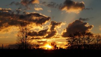 clouds on orange sunset sky