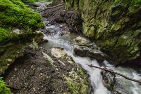 running water among the rocks like a river