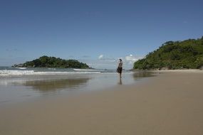 woman walking by Beach at Sea, Brazil