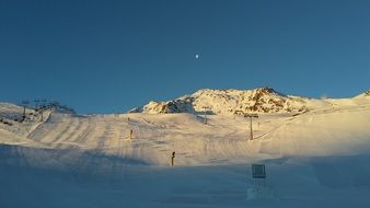 panorama of a wide ski run in the mountains of austria